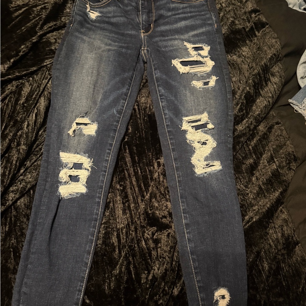 Distressed Blue Jeans